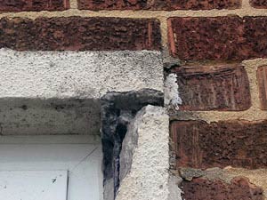 Severely spalled lintel corner